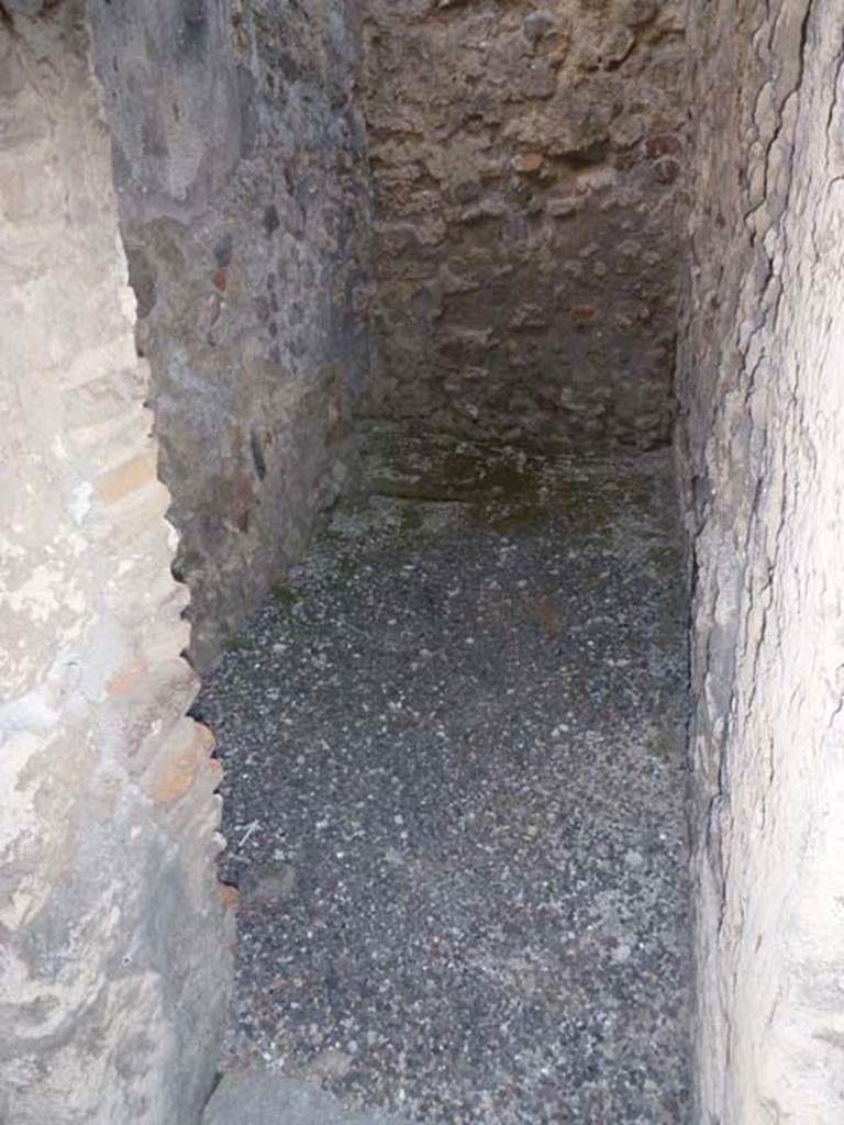 V.3.8 Pompeii. June 2012. Doorway to narrow room on west side of entrance corridor.
Photo courtesy of Michael Binns.