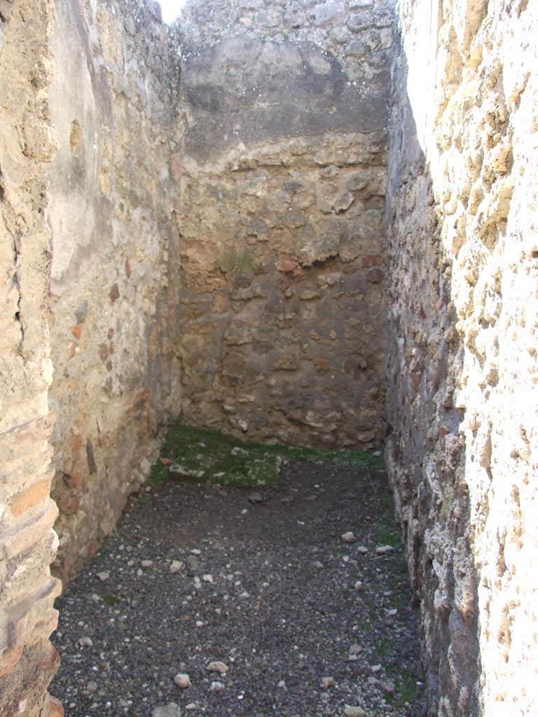 V.3.8 Pompeii. March 2009. West wall of narrow room on west side of entrance corridor.