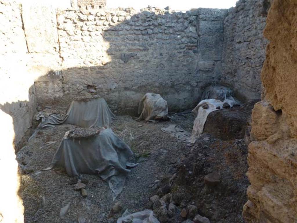 V.3.8 Pompeii. June 2012. Looking south in large room behind oven. Photo courtesy of Michael Binns.