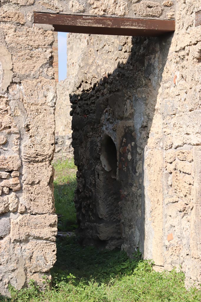 V.3.8 Pompeii. October 2023. 
Looking north through corridor in north-east corner of atrium. Photo courtesy of Klaus Heese.