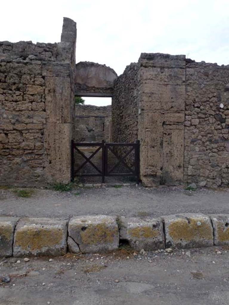 V.3.8 Pompeii. September 2011. Looking north to entrance doorway on Via di Nola. 
Photo courtesy of Michael Binns.