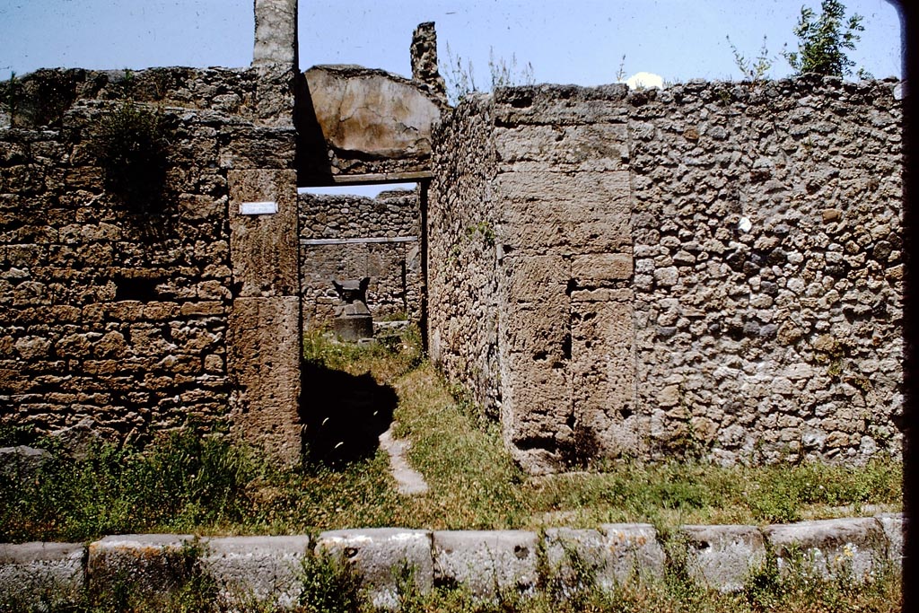 V.3.8 Pompeii. 1964. Looking north to entrance doorway on Via di Nola. Photo by Stanley A. Jashemski.  
Source: The Wilhelmina and Stanley A. Jashemski archive in the University of Maryland Library, Special Collections (See collection page) and made available under the Creative Commons Attribution-Non Commercial License v.4. See Licence and use details.
J64f1634