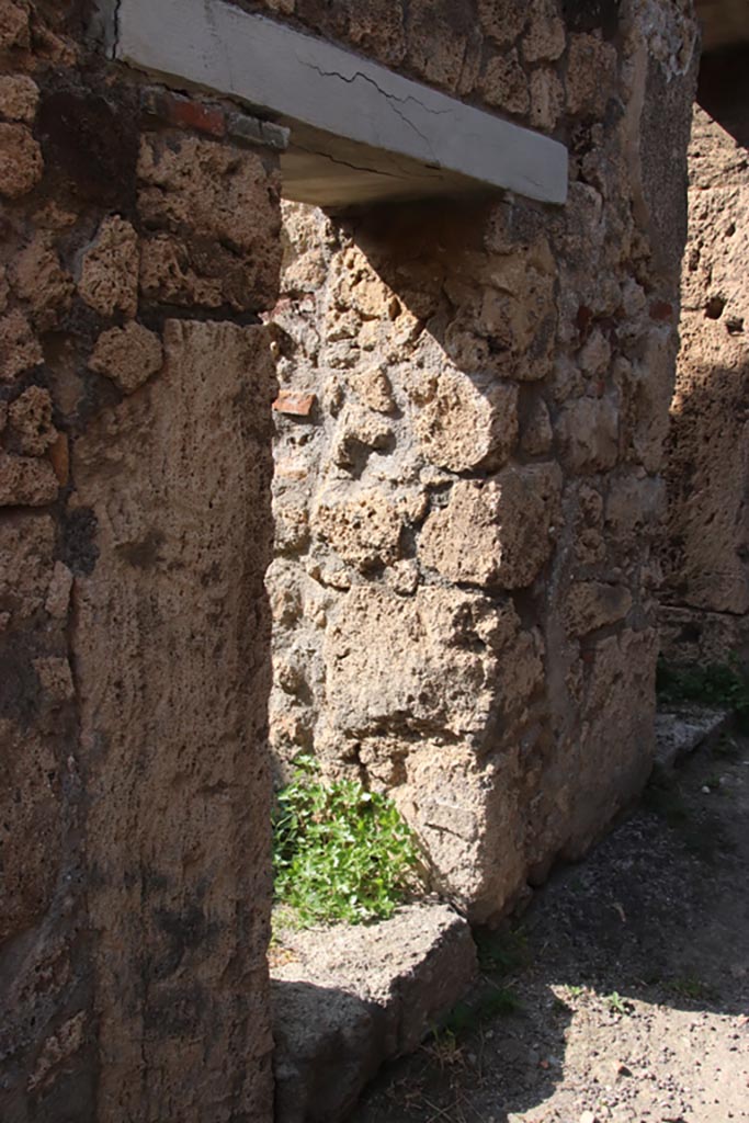 V.3.8 Pompeii. October 2023. 
Two doorways to rooms on west side of entrance corridor. Photo courtesy of Klaus Heese.