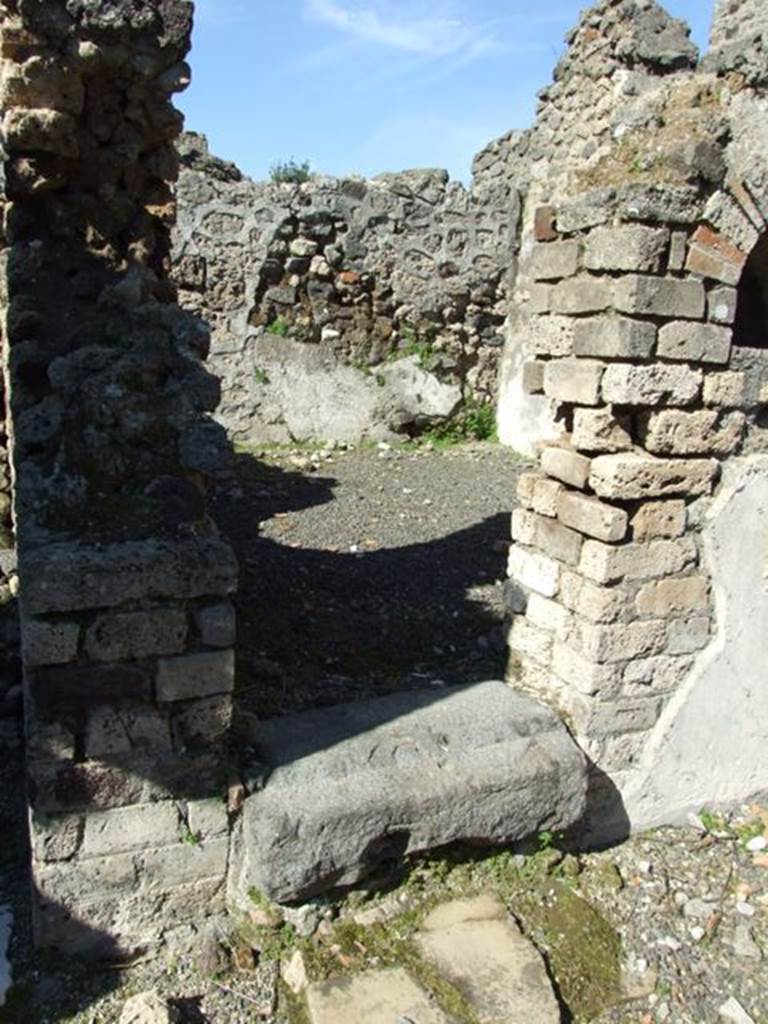 V.3.9 Pompeii. March 2009. North side of atrium, steps to upper floor. According to NdS, when found there were two steps of a staircase, the first was made of plastered brick with cocciopesto, the second was lava. The other steps would have been made of wood, as was usual.
See Notizie degli Scavi, 1902, dated November 1901, p.201-203
