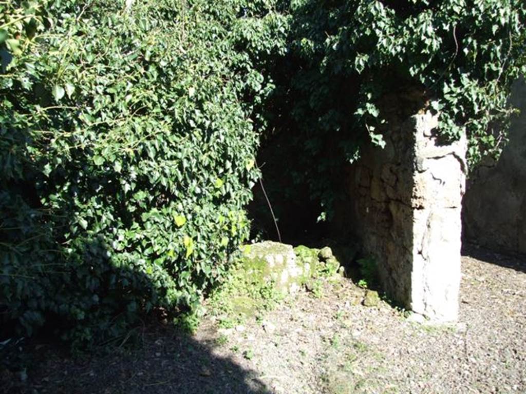 V.3.11 Pompeii. March 2009. Doorway to room on north side of entrance corridor.
According to NdS, this was probably a small storeroom that also contained the steps to the upper floor.