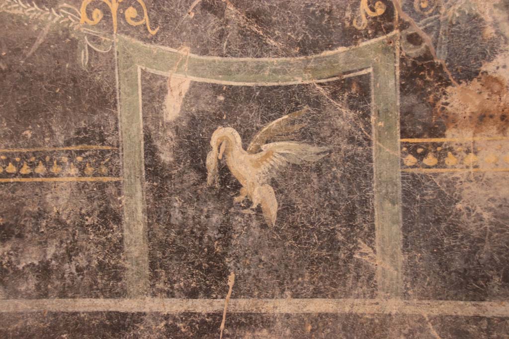 V.3 Pompeii. Casa del Giardino. September 2021. 
Room 1, south wall, detail of painted decoration from centre of zoccolo. Photo courtesy of Klaus Heese.