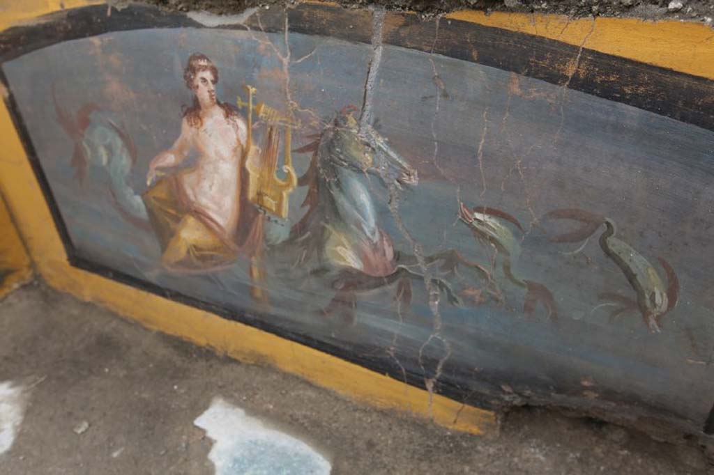 V.3 Pompeii. March 2019. The richly decorated Thermopolium in the open space which acts as a crossroads between Vicolo delle Nozze d’Argento and Vicolo dei Balconi. 
On one side, the decorations on the counter depict the beautiful figure of a Nereid on horseback in a marine environment.
V.3 Pompei. Marzo 2019. Termopolio all'incrocio tra il Vicolo delle Nozze d'Argento e il Vicolo dei Balconi.
Le decorazioni del bancone raffigurano su un lato, una bella figura di Nereide su cavallo in ambiente marina. 
Photograph © of Parco Archeologico di Pompei.