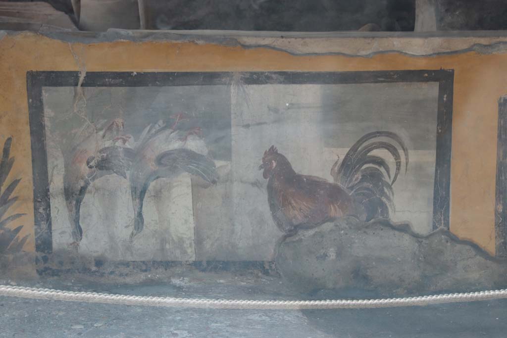 V.3 Pompeii, Thermopolium with painting of nereid. September 2021. 
Painted detail of west side of counter in bar-room. Photo courtesy of Klaus Heese.