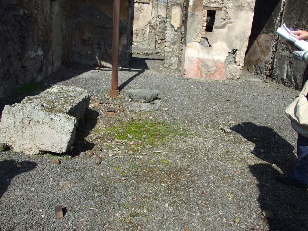 V.4.3 Pompeii. March 2009. Site of impluvium in the atrium.
According to Sogliano, found at the head of the impluvium was a travertine marble puteal, a marble table broken into five pieces, and a cylindrical lead tank.
Also found here were a human skeleton, as well as some animal bones.
See Notizie degli Scavi di Antichità, 1899, (p.144)
Other finds from the house are listed on pages 103 and 145.