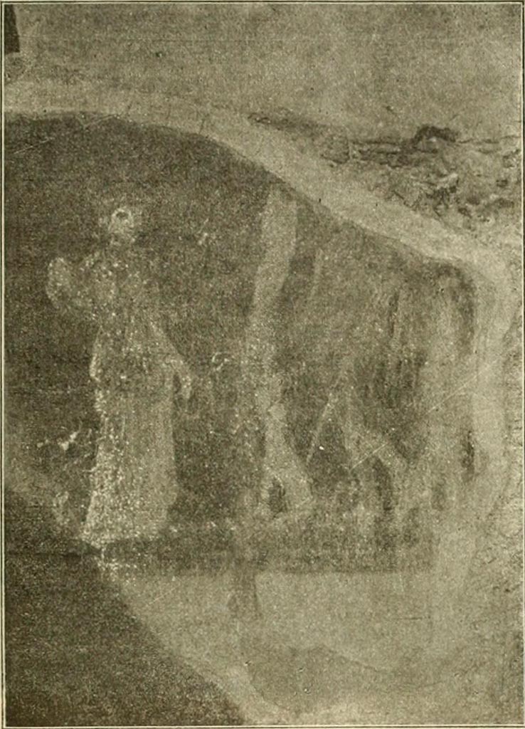 V.4.6/7 Pompeii. Painting of Maenad with Bacchus. The background was red. 
On the right was Bacchus, but his head was missing from the painting. 
He poured the liquid from a jug into the mouth of his panther.
On the left we see a standing Maenad, crowned with ivy and dressed in green robe.
In her right hand she held a tambourine and a wand in her left.
See Notizie degli Scavi di Antichità, 1899, p. 345, fig 6.