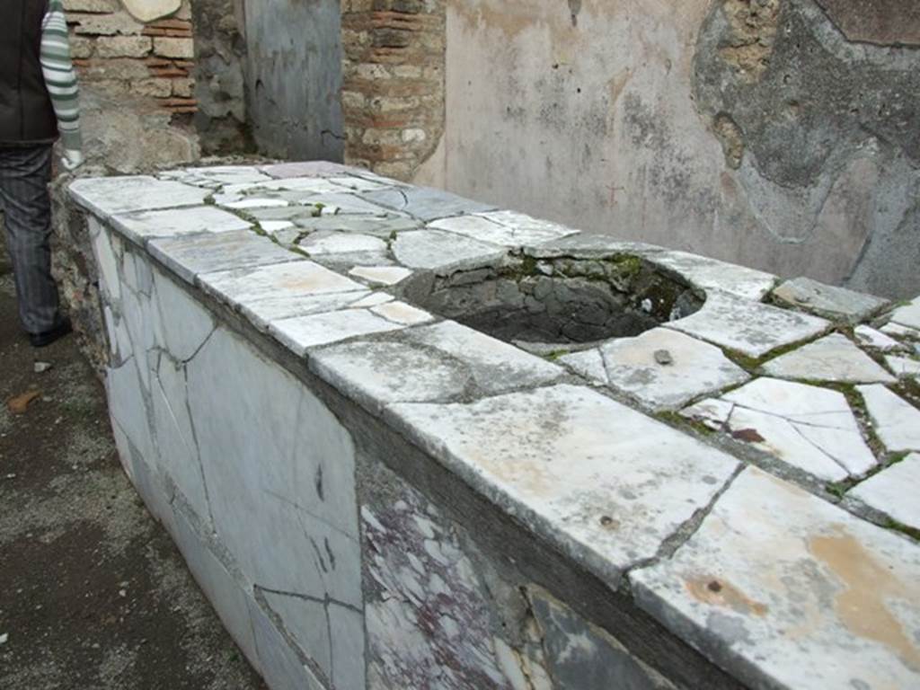 V.4.7 Pompeii.  December 2007.  Marble counter.