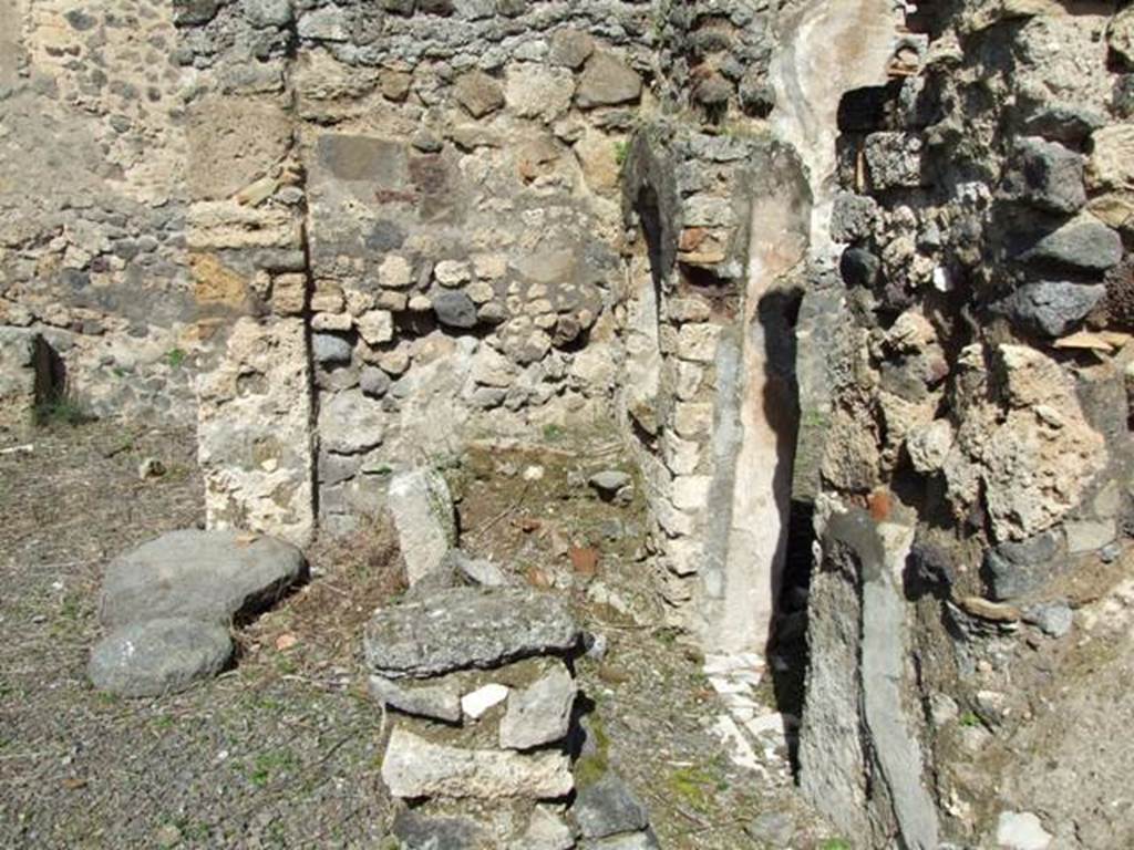 V.4.9 Pompeii. March 2009. North-east side of atrium with site of small kitchen and doorway to triclinium.