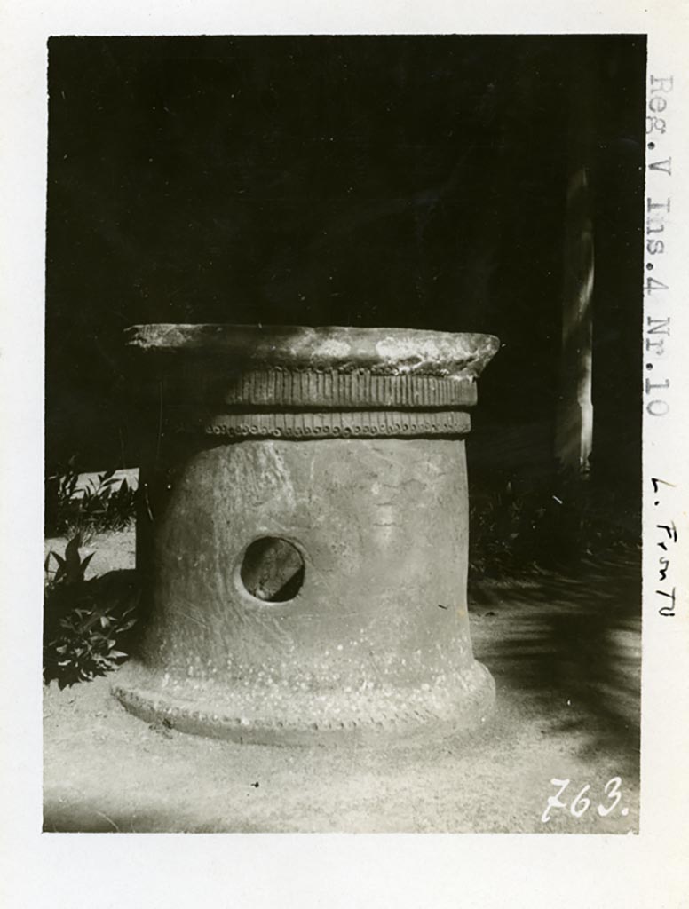 V.4.a Pompeii but shown as V.4.10 on photo.Pre-1937-39. Terracotta puteal. 
Photo courtesy of American Academy in Rome, Photographic Archive. Warsher collection no. 763.
