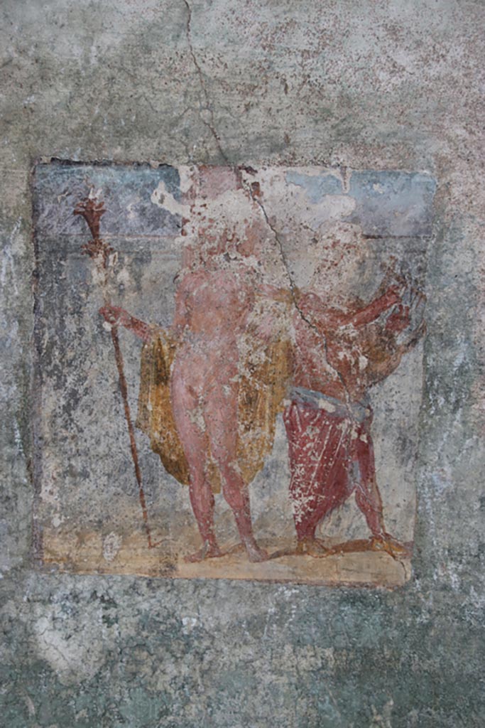 V.4.a Pompeii. October 2023. 
Room ‘s’, east wall, wall painting of Dionysus (Bacchus) accompanied by Silenus playing the lyre.
Photo courtesy of Klaus Heese.