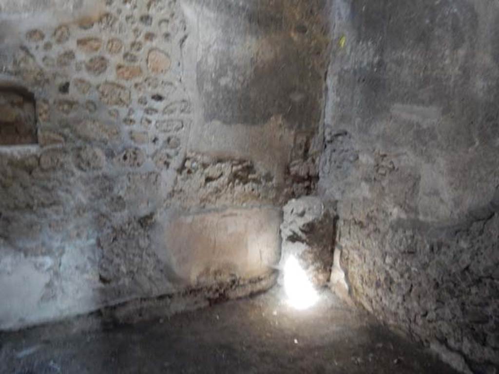 V.4.a Pompeii. May 2015. 
Room ‘x’, looking towards north wall with small niche in north-west corner. Photo courtesy of Buzz Ferebee.