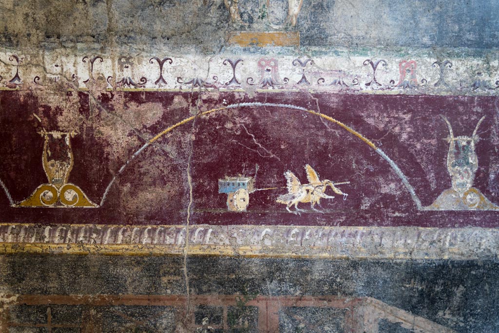 V.4.a Pompeii. January 2023. 
Room ‘h’, detail from painted predella on north wall on east side of central panel. Photo courtesy of Johannes Eber.