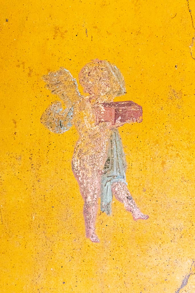 V.4.a Pompeii. October 2023. 
Room ‘i’, detail from east end of south wall of cubiculum. Photo courtesy of Johannes Eber.