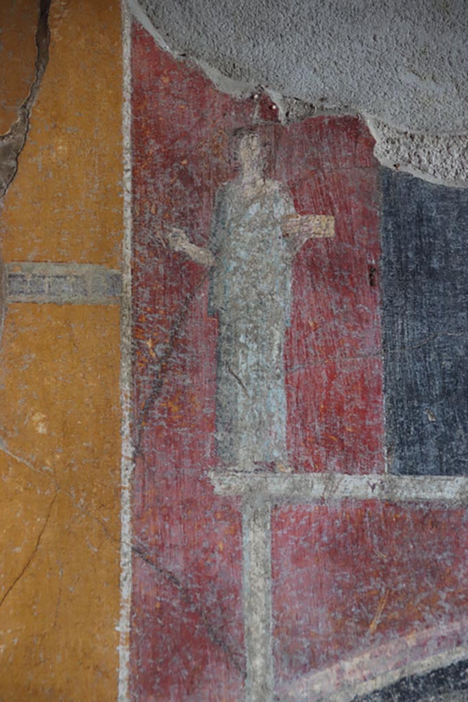 V.4.a Pompeii. October 2023. 
Room ‘g’, detail from upper east wall above central panel. Photo courtesy of Klaus Heese.