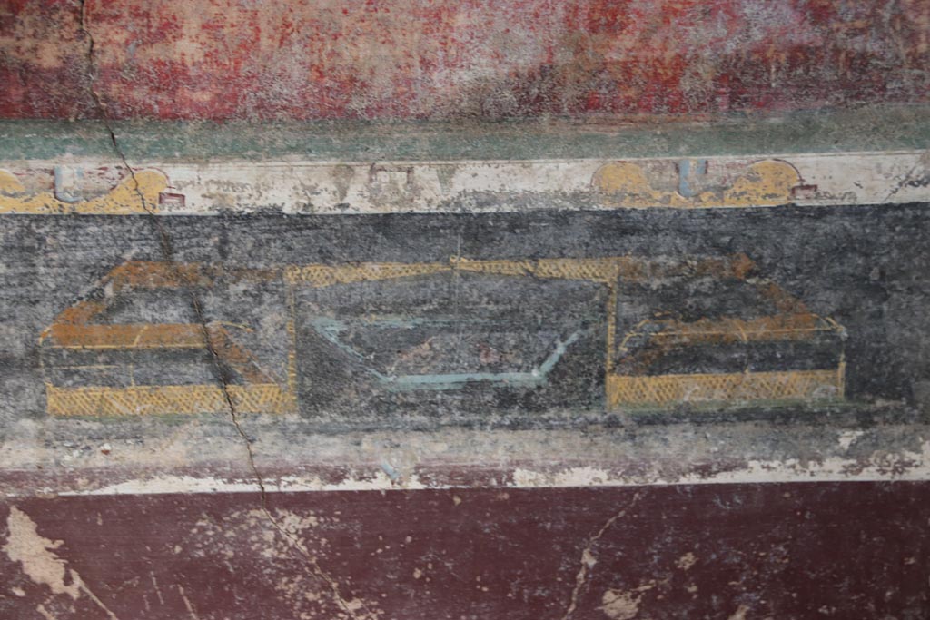 V.4.a Pompeii. October 2023. Room ‘g’, detail of garden painting in predella in centre of east wall. Photo courtesy of Klaus Heese.