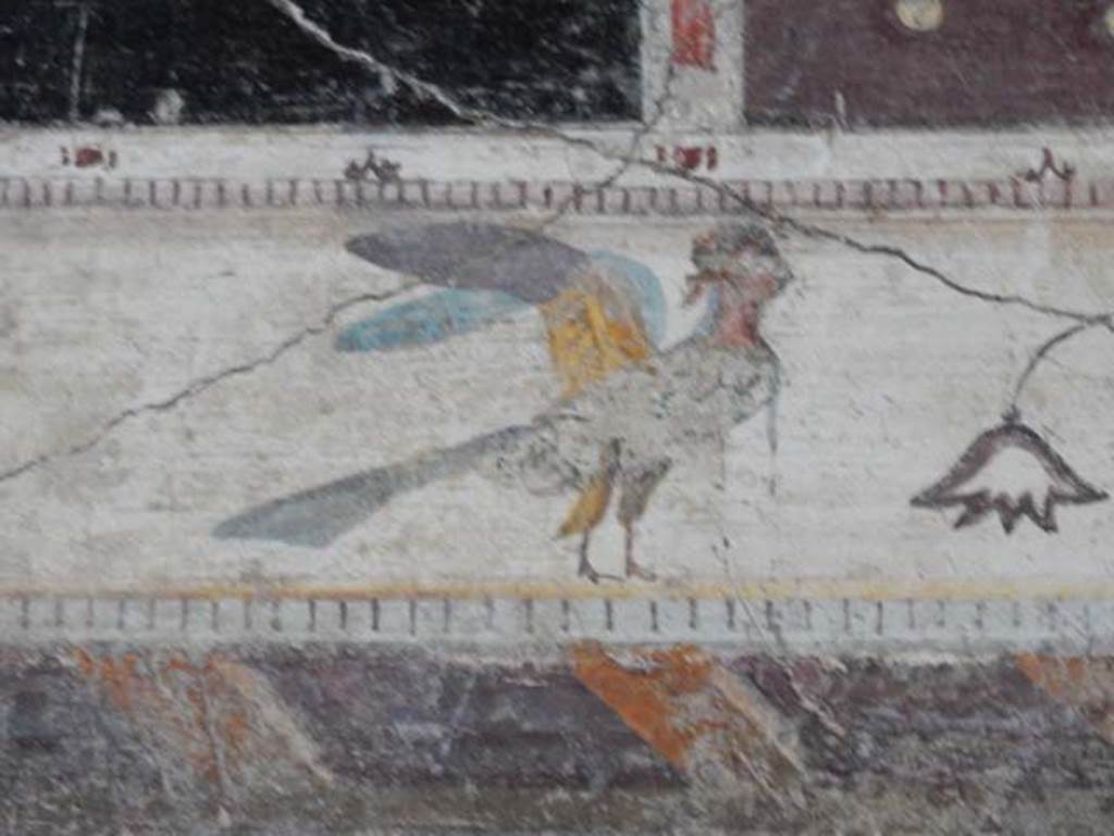 V.4.a Pompeii. May 2015. Detail from upper centre of west wall of cubiculum. 
Photo courtesy of Buzz Ferebee.