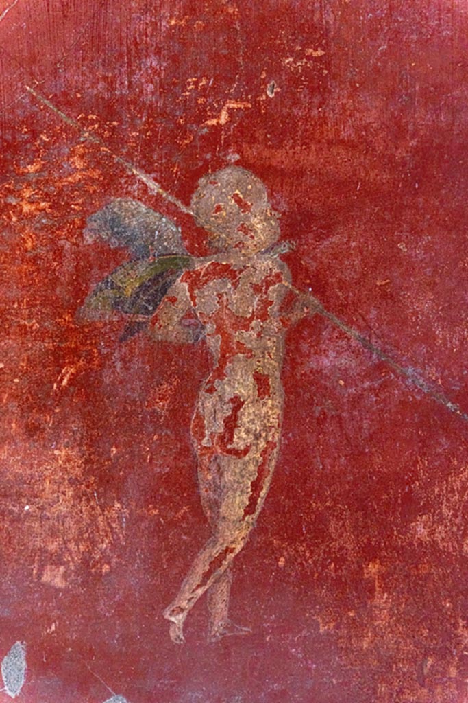 V.4.a Pompeii. October 2023. 
Room ‘f’, detail of painted figure from panel at north end of east wall. Photo courtesy of Johannes Eber.