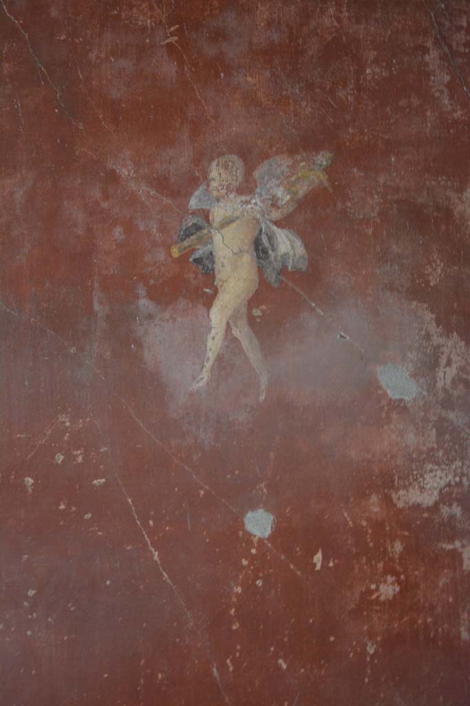 V.4.a Pompeii. March 2019. 
Room ‘f’, detail of painted figure from panel at south end of east wall.
Foto Annette Haug, ERC Grant 681269 DÉCOR.