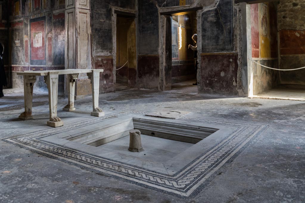 V.4.a Pompeii. January 2023. Looking south-east across impluvium in atrium. Photo courtesy of Johannes Eber.