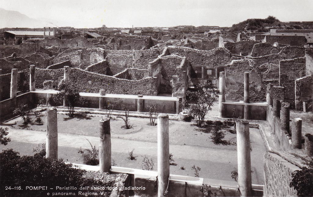 V.5.3 Pompeii. c.1930’s? Looking west across peristyle. 
The area of the north portico and rooms in north-west, on the right, were destroyed by the bombing of September 1943.
Photograph by Brunner & Co., Como, numbered 24-116.
Photo courtesy of Espen B. Andersson