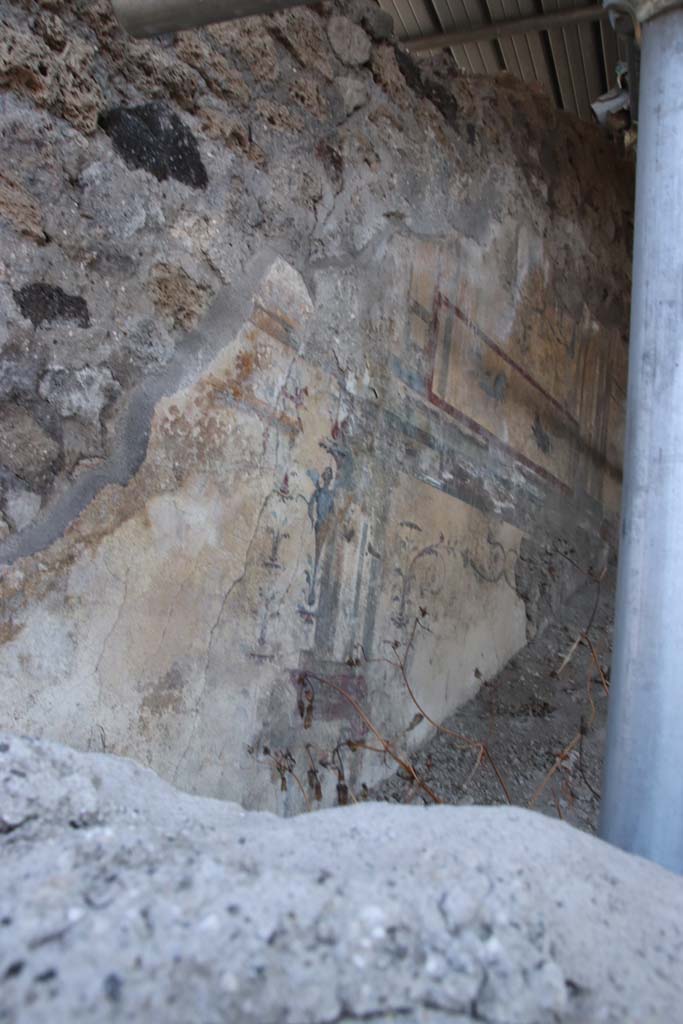 V.6.12 Pompeii, September 2021. 
Looking towards painted decoration on west end of centre of north wall. Photo courtesy of Klaus Heese.