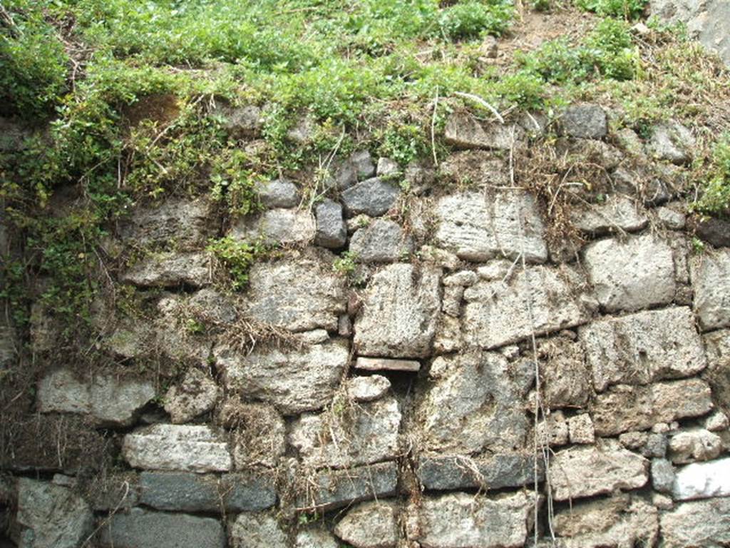 Pompeii. May 2005. Blocked vicolo, north from Via delle Nozze d’Argento, at the time unexcavated.
This was partially excavated in 2018/9 and now forms a continuation of the Vicolo di Cecilio Giocondo.