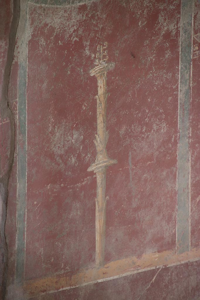 V.7.7 Pompeii. October 2024.
Looking towards painted candelabra on east wall of entrance corridor. Photo courtesy of Klaus Heese.
