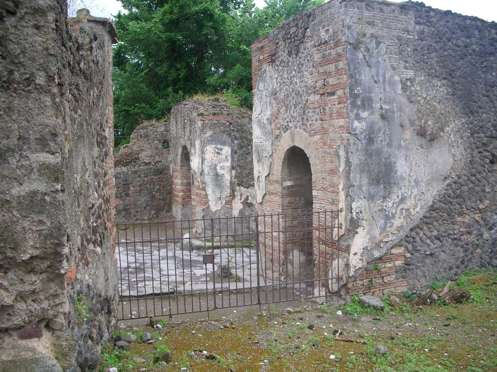 VI.1.1 Pompeii. May 2010. 
Looking west towards entrance onto Via Consolare on south side of Herculaneum Gate. Photo courtesy of Ivo van der Graaff.