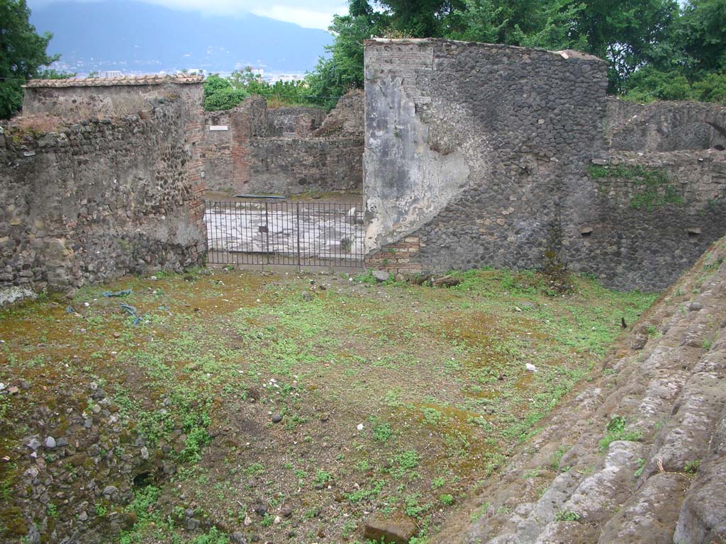 VI.1.1 Pompeii. May 2010. 
Looking west from steps towards entrance onto Via Consolare on south side of Herculaneum Gate. Photo courtesy of Ivo van der Graaff.