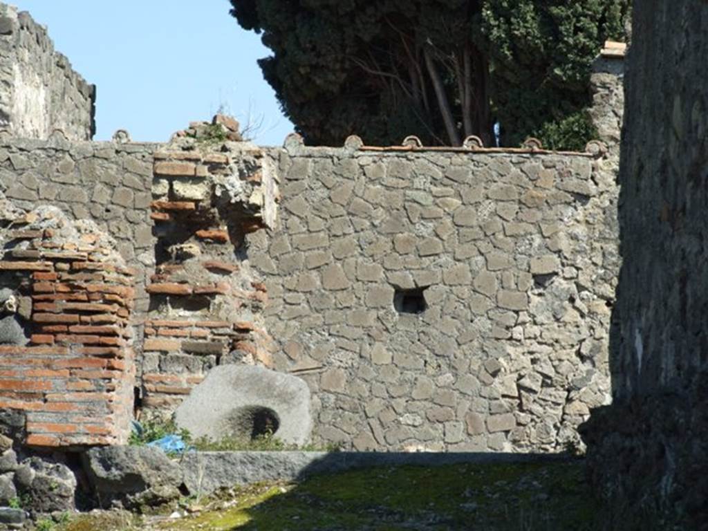VI.1.1 Pompeii. March 2009. Looking east to rebuilt east wall in the area of rooms 3 (the stairs) and room 4.