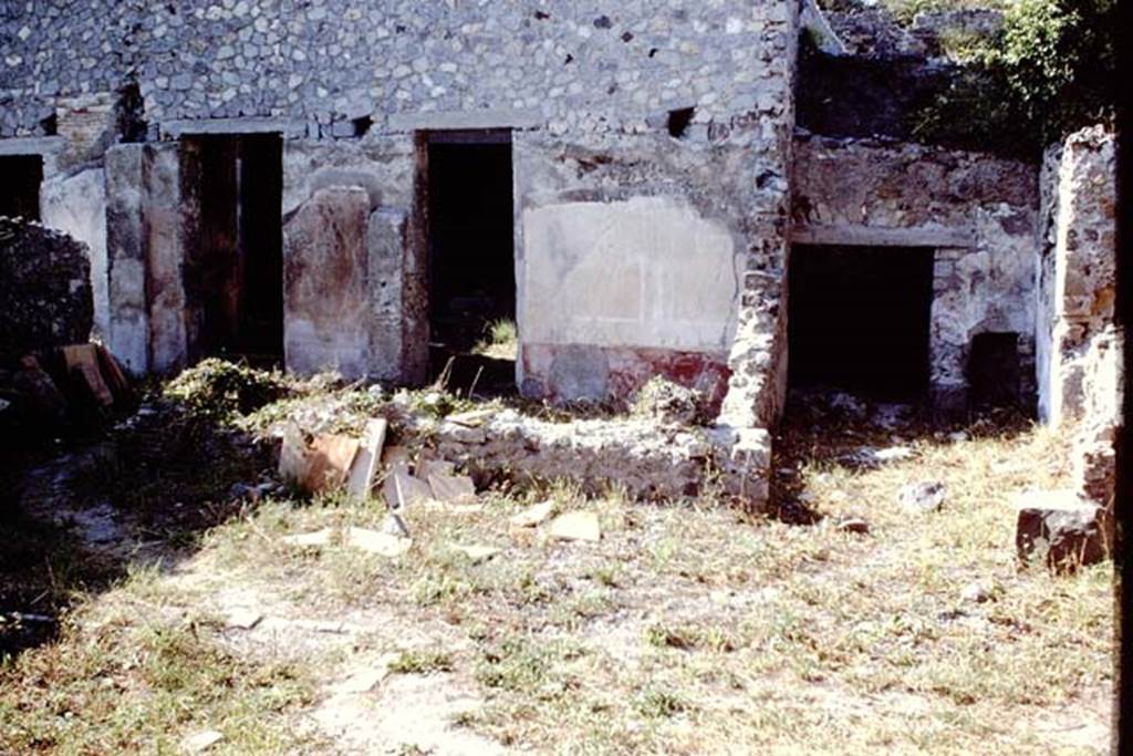 VI.1.7 Pompeii, 1968. Looking north towards rooms 11 and 12. The doors at the rear of the rooms lead to the peristyle 13. 
Room 28 is on the right which has room 24 behind it and room 25 leading to room 26 on its right.
Photo by Stanley A. Jashemski.
Source: The Wilhelmina and Stanley A. Jashemski archive in the University of Maryland Library, Special Collections (See collection page) and made available under the Creative Commons Attribution-Non Commercial License v.4. See Licence and use details.
J68f2321