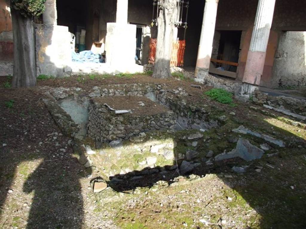 VI.1.7 Pompeii. December 2007. Looking north-east across pools in peristyle.According to Jashemski, the four-sided portico was supported on the west, south and east by twelve stuccoed columns. The columns were smooth below and fluted above, red below and white above. Next to the corner columns on the north side were rectangular pillars decorated to match the columns. Between them, in the centre of the north portico, were two additional pillars surmounted by columns. These columns and pillars were joined by a low wall, which had an entrance into the garden from the south.
See Jashemski, W. F., 1993. The Gardens of Pompeii, Volume II: Appendices. New York: Caratzas. (p.119)