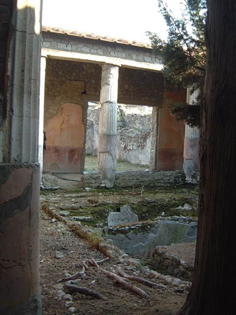 VI.1.7 Pompeii. Looking south-west across peristyle towards doorway to triclinium. Photograph May 2001 courtesy of Current Archaeology.
According to Jashemski, the triclinium off the south-west corner of the portico had a good view of the garden. See Jashemski, W. F., 1993. The Gardens of Pompeii, Volume II: Appendices. New York: Caratzas. (p.119)