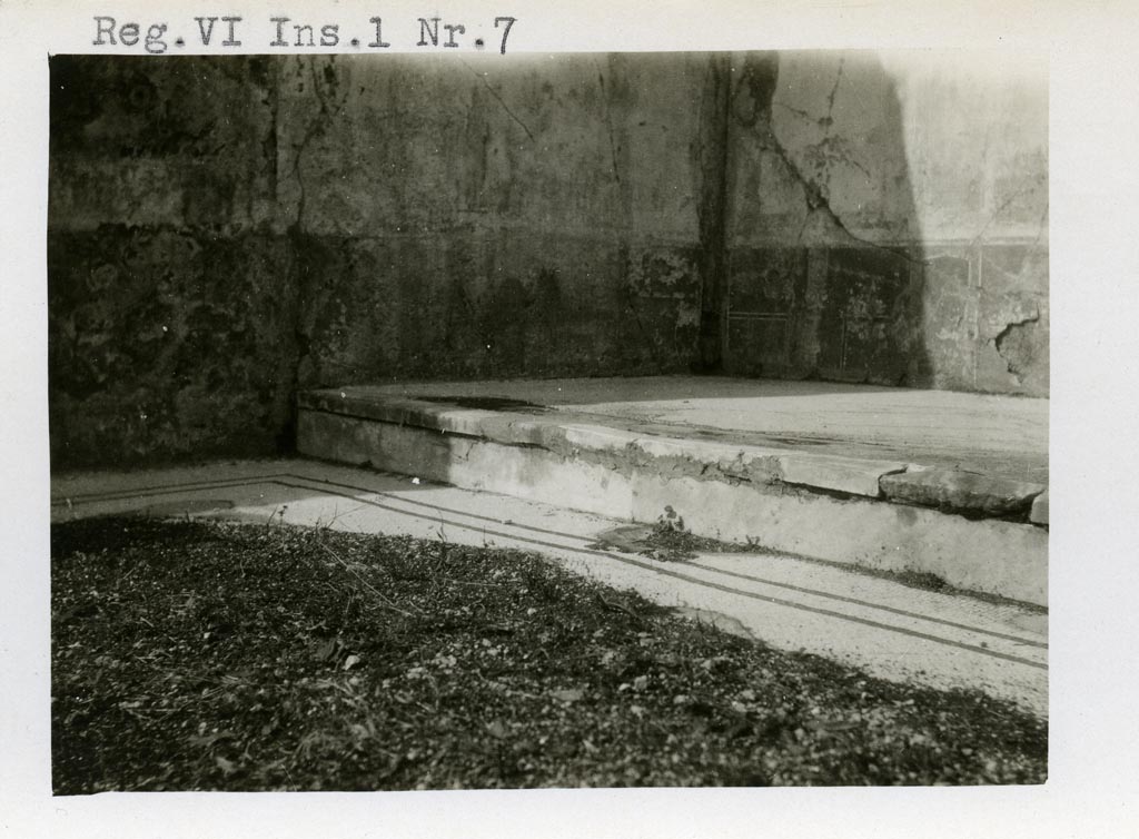 VI.1.7 Pompeii. Pre-1937-39. 
Looking towards north-west corner and white mosaic flooring in main room with a two-line border in black, and step to alcove/recess.
Photo courtesy of American Academy in Rome, Photographic Archive. Warsher collection no. 1400.