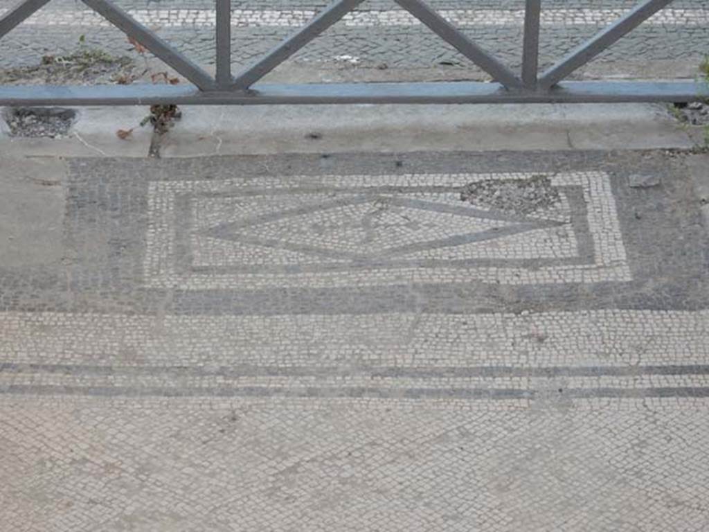 VI.1.8 Pompeii. May 2017. Mosaic threshold of doorway to atrium of VI.1.7, on east side.  Photo courtesy of Buzz Ferebee.
