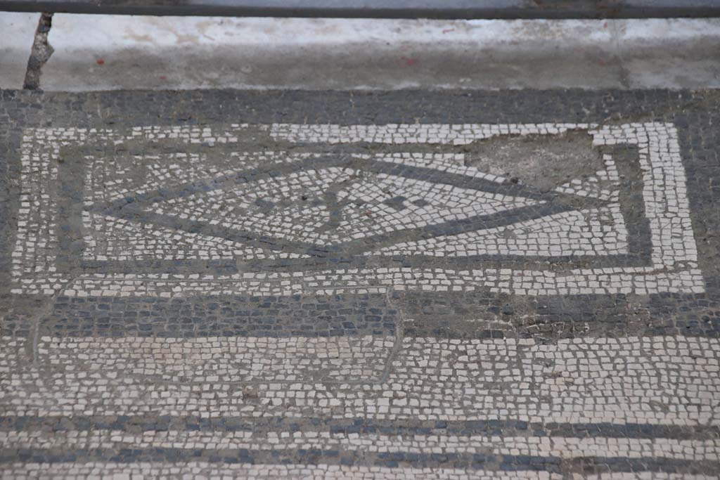 VI.1.8 Pompeii. September 2021. 
Detail of mosaic threshold of doorway leading to atrium of VI.1.7, on east side. Photo courtesy of Klaus Heese.