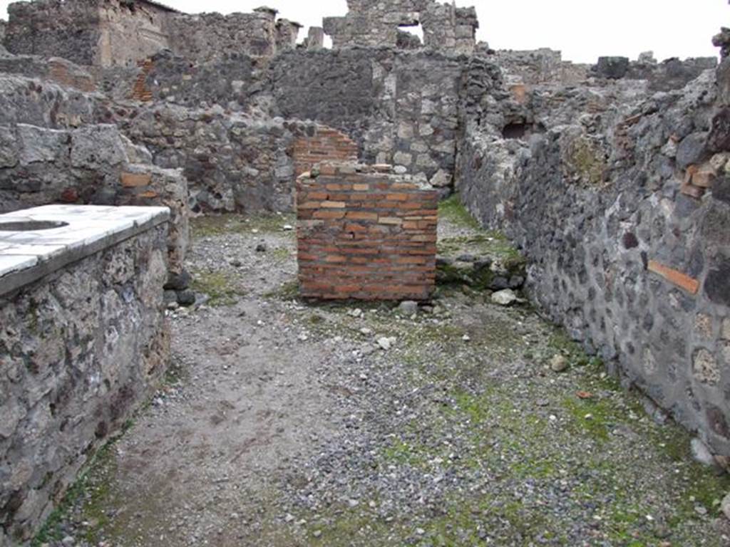 VI.1.17 Pompeii. December 2007.  Looking to rear with room for the customers on left and corridor on the right leading to the latrine.