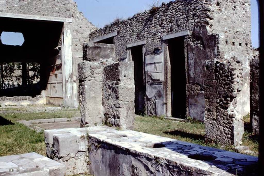 VI.2.4 Pompeii. 1968. Doorways to rooms on south side of atrium taken from VI.2.5, with the entrance corridor, on the right. Photo by Stanley A. Jashemski.
Source: The Wilhelmina and Stanley A. Jashemski archive in the University of Maryland Library, Special Collections (See collection page) and made available under the Creative Commons Attribution-Non Commercial License v.4. See Licence and use details.
J68f1986