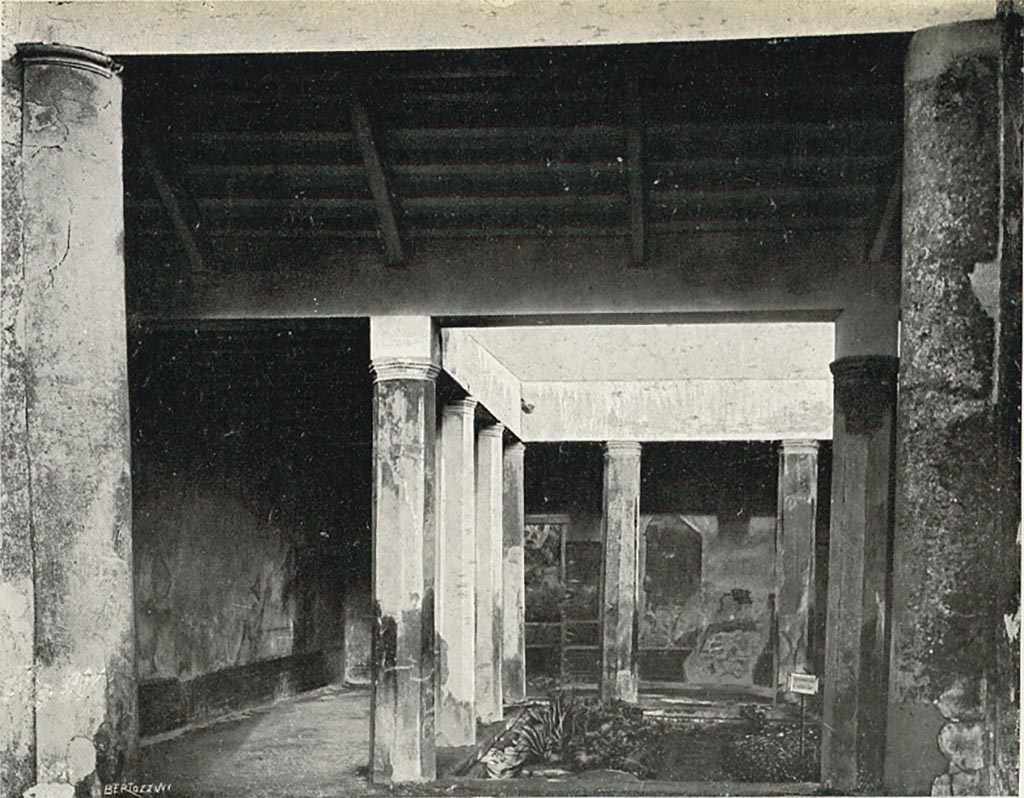 VI.2.4 Pompeii. c.1908-1909. Looking east across small garden area/peristyle from doorway of large triclinium. 
According to Sogliano –
The above photo, fig. 4, shows the north and east sides of the peristyle, looking from the west side.
See Sogliano, A. (1909). Dei lavori eseguiti in Pompei dal i Luglio 1908 a tutto Giugno 1909, (fig.4, p.18/19).