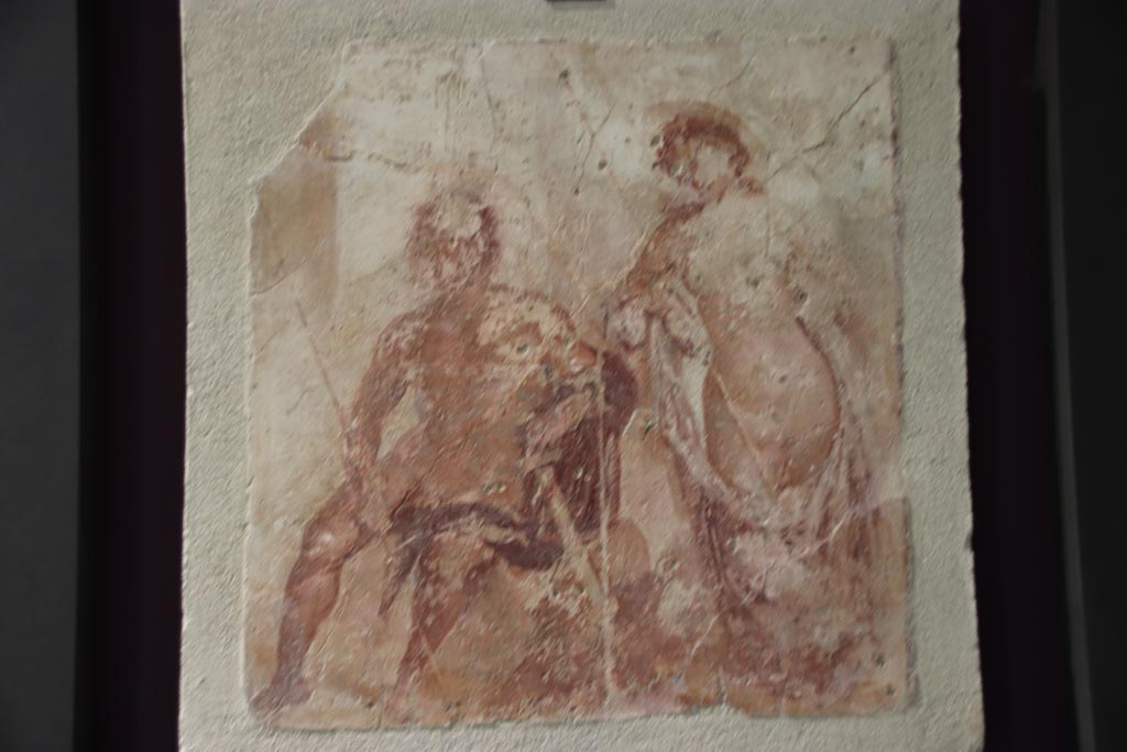 VI.2.22 Pompeii. October 2022. 
Wall painting from centre of south wall of tablinum, Meleager and Atalanta, lovers resting after the hunt of the Calydonian boar.
Photo courtesy of Klaus Heese.