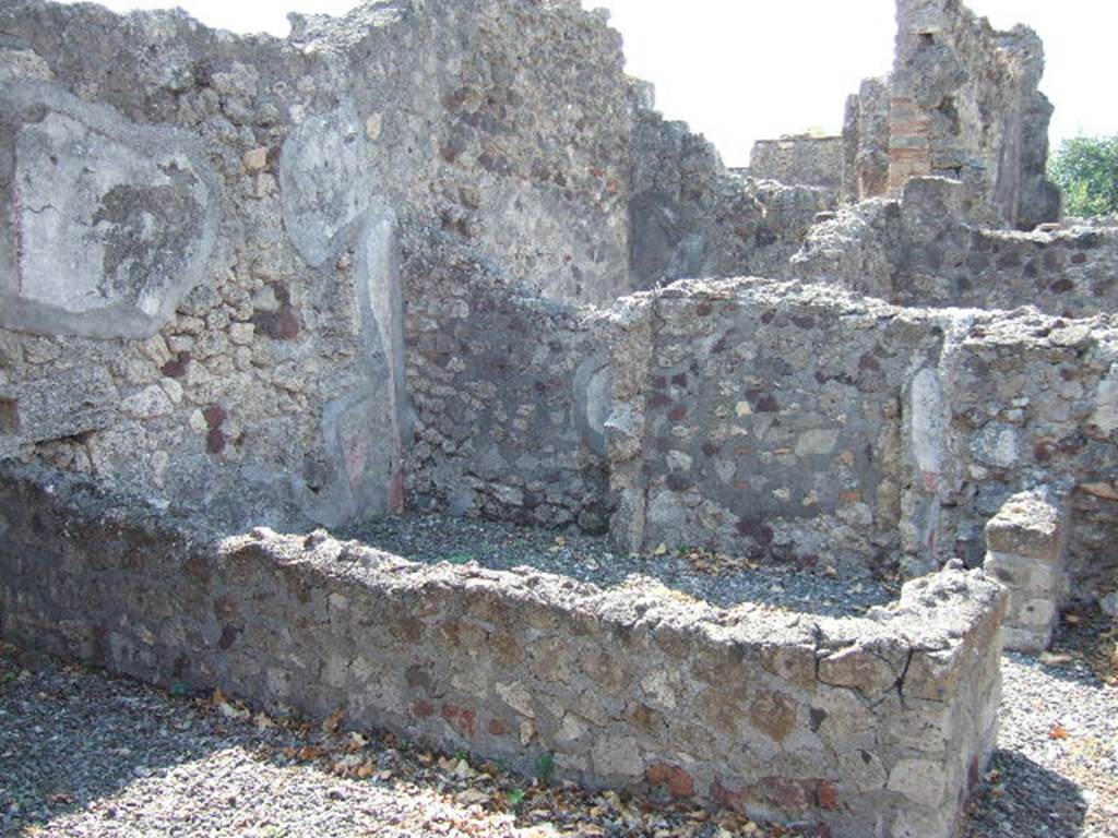 VI.2.27 Pompeii. September 2005.  West wall of triclinium, with small cubiculum with antechamber on its west side.