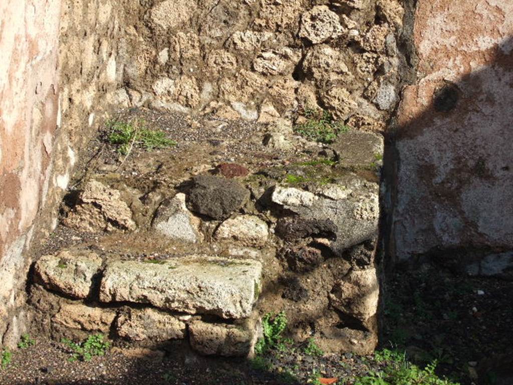 VI.3.6 Pompeii. December 2005. Steps to upper floor in north-east corner of shop. According to Eschebach and Hobson, there may have been a latrine nearby. See Eschebach, L., 1993. Gebäudeverzeichnis und Stadtplan der antiken Stadt Pompeji. Köln: Böhlau. (p.163) See Hobson, B. 2009. Pompeii, Latrines and Down Pipes. Oxford, Hadrian Books, (p.196)