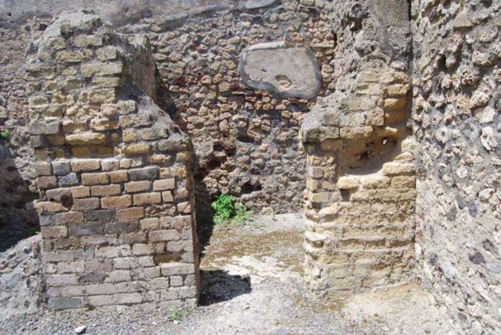 VI.3.20 Pompeii. May 2013. Looking into rear room in north-east corner of bar-room.
Photo courtesy of Paula Lock.
