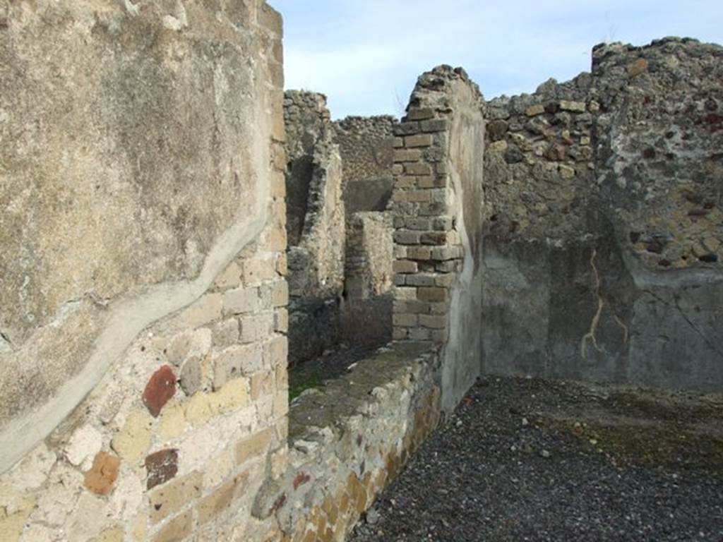 VI.5.3 Pompeii. December 2007. Room 5, north wall of triclinium with window onto garden.