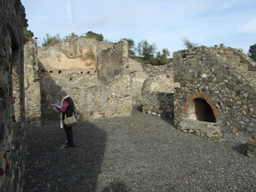 VI.5.3 Pompeii. December 2007. Room 12, looking north-east towards stairs to upper floor, and four rooms with rooms above on an upper floor. See Pappalardo, U., 2001. La Descrizione di Pompei per Giuseppe Fiorelli (1875). Napoli: Massa Editore. (p.54)