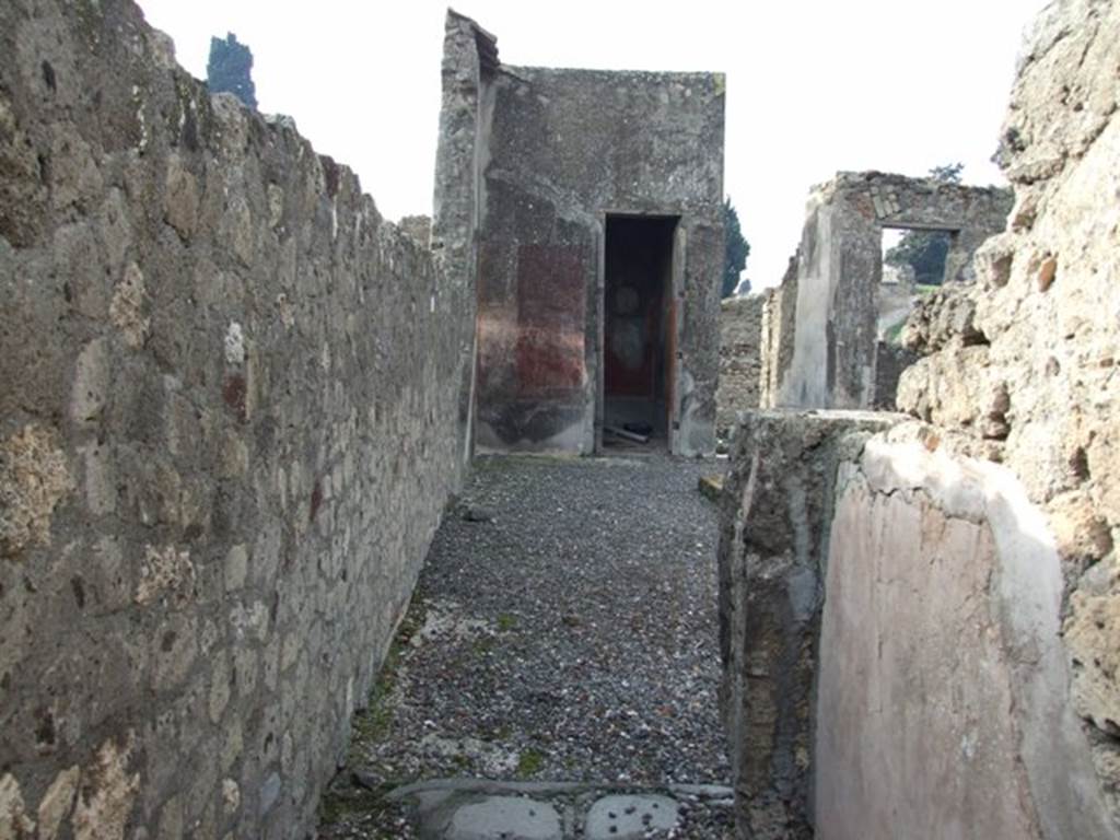 VI.5.3 Pompeii.  December 2007. Looking west from the corridor of room 7 across the south side of atrium to doorway to room 20.  According to Breton, on the left would have been the wall with the painting of Neptune.  According to Helbig, the atrium also contained a painting – the chariot of Artemis (246) as well as one of Poseidon or Neptune. (172)
See Breton, Ernest. 1870. Pompeia, Guide de visite a Pompei, 3rd ed. Paris, Guerin.  See Helbig, W., 1868. Wandgemälde der vom Vesuv verschütteten Städte Campaniens. Leipzig: Breitkopf und Härtel. (246, 172)  Schefold showed a black-and-white photo of this wall in Taf.101 of the book below. See Schefold, K., 1962. Vergessenes Pompeji. Bern: Francke.(p.122 and Taf.101)